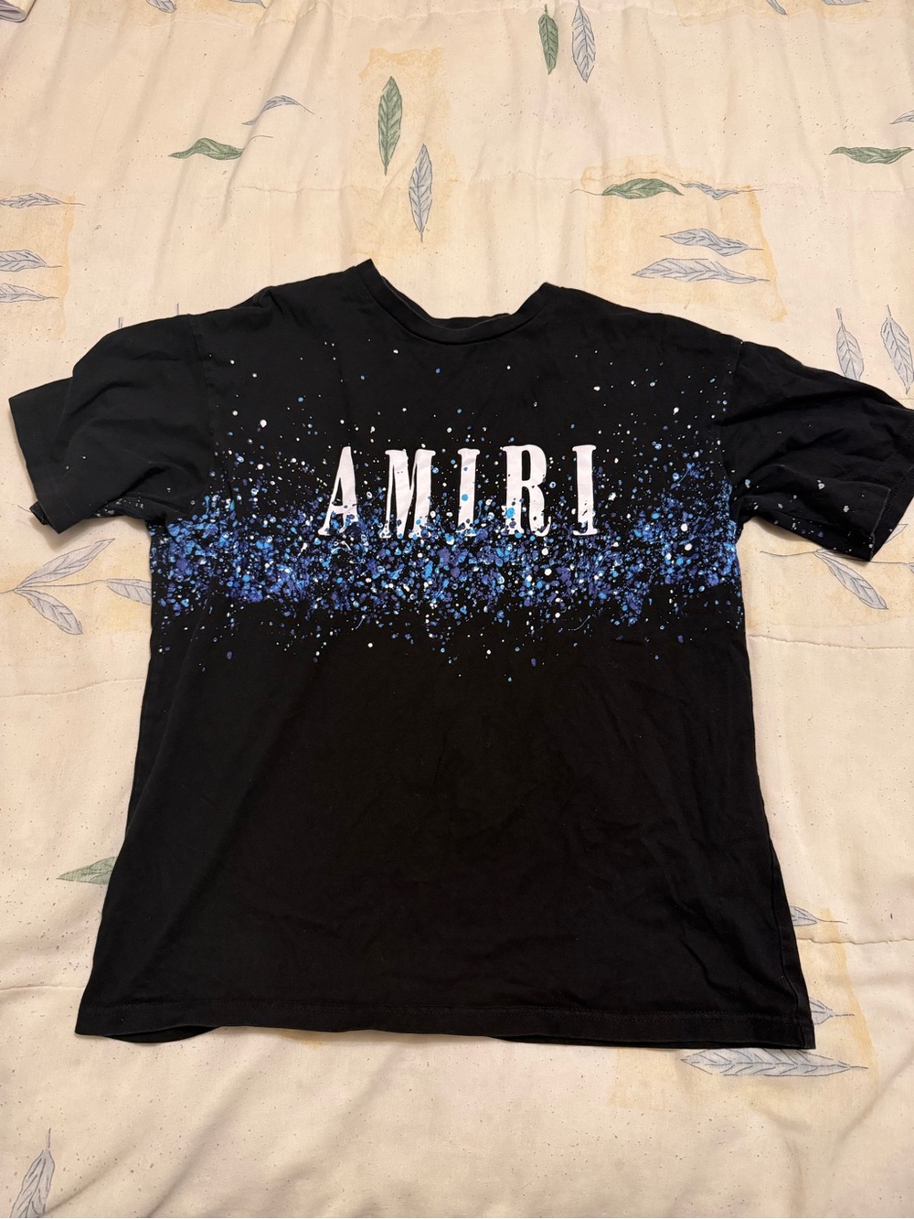 AMIRI Black T-Shirt with Blue Splatter and White Logo